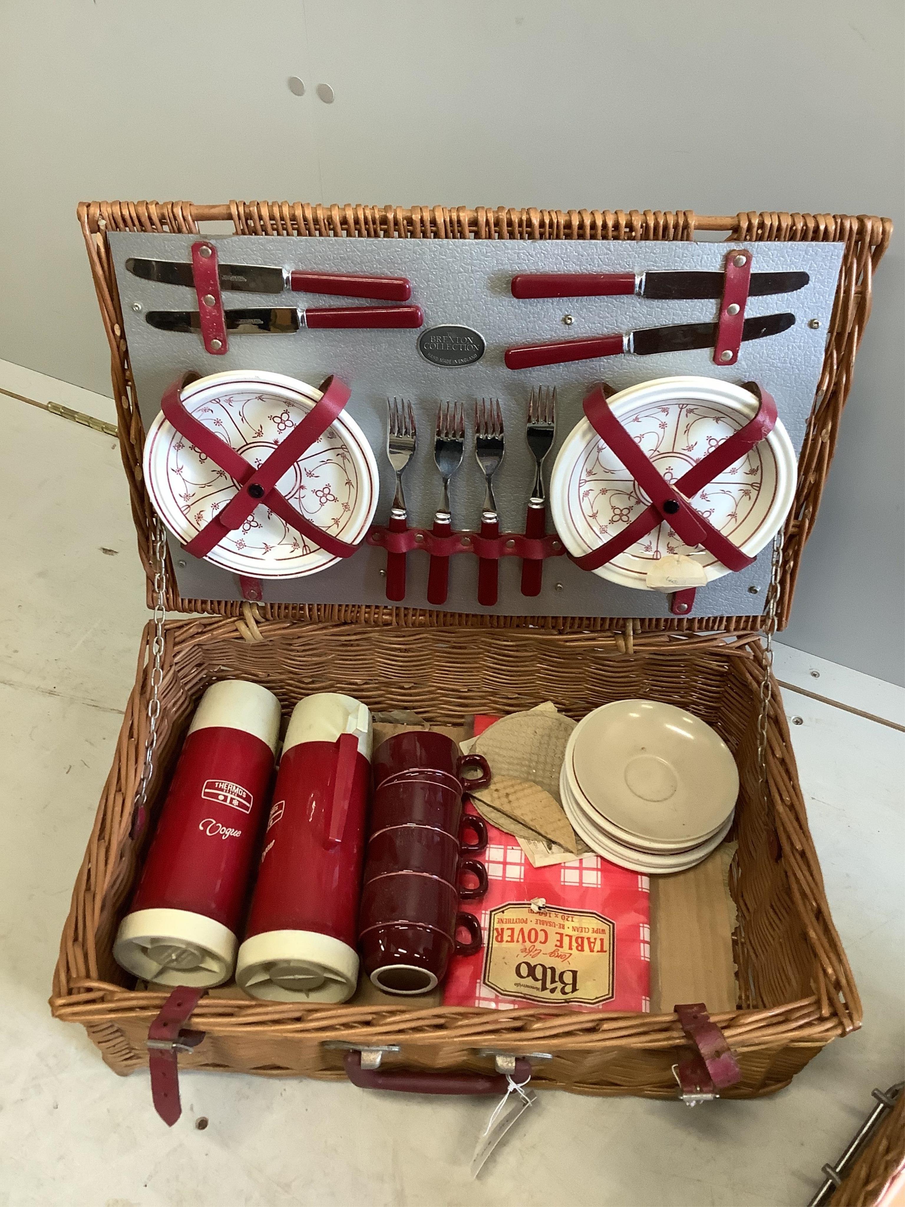 Two vintage picnic hampers with contents, larger width 64cm, depth 35cm, height 21cm. Condition - fair